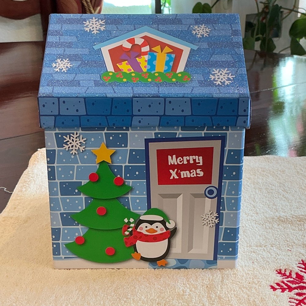 Festive Christmas Gift Box with Tree and Penguin Design